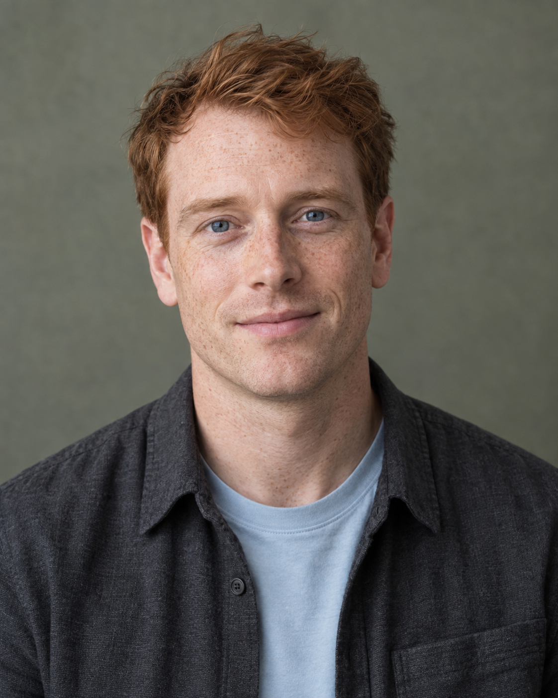 Illustrative portrait of Owen Calder with copper hair and a charcoal overshirt
